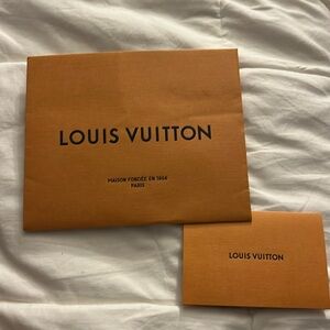 Louis vuitton paper bag and card . Authentic.